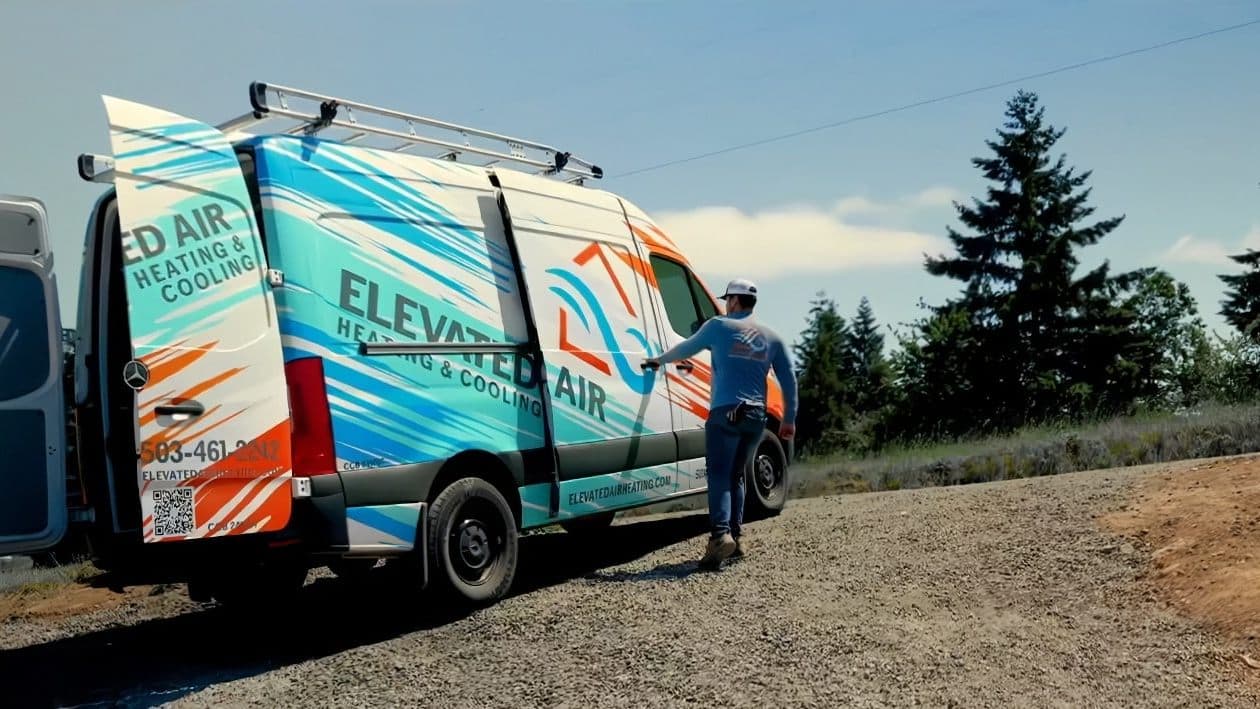 Elevated Air Heating & Cooling - HVAC Installation in Salem, OR HVAC contractor installing outdoor AC condenser unit in Salem Oregon